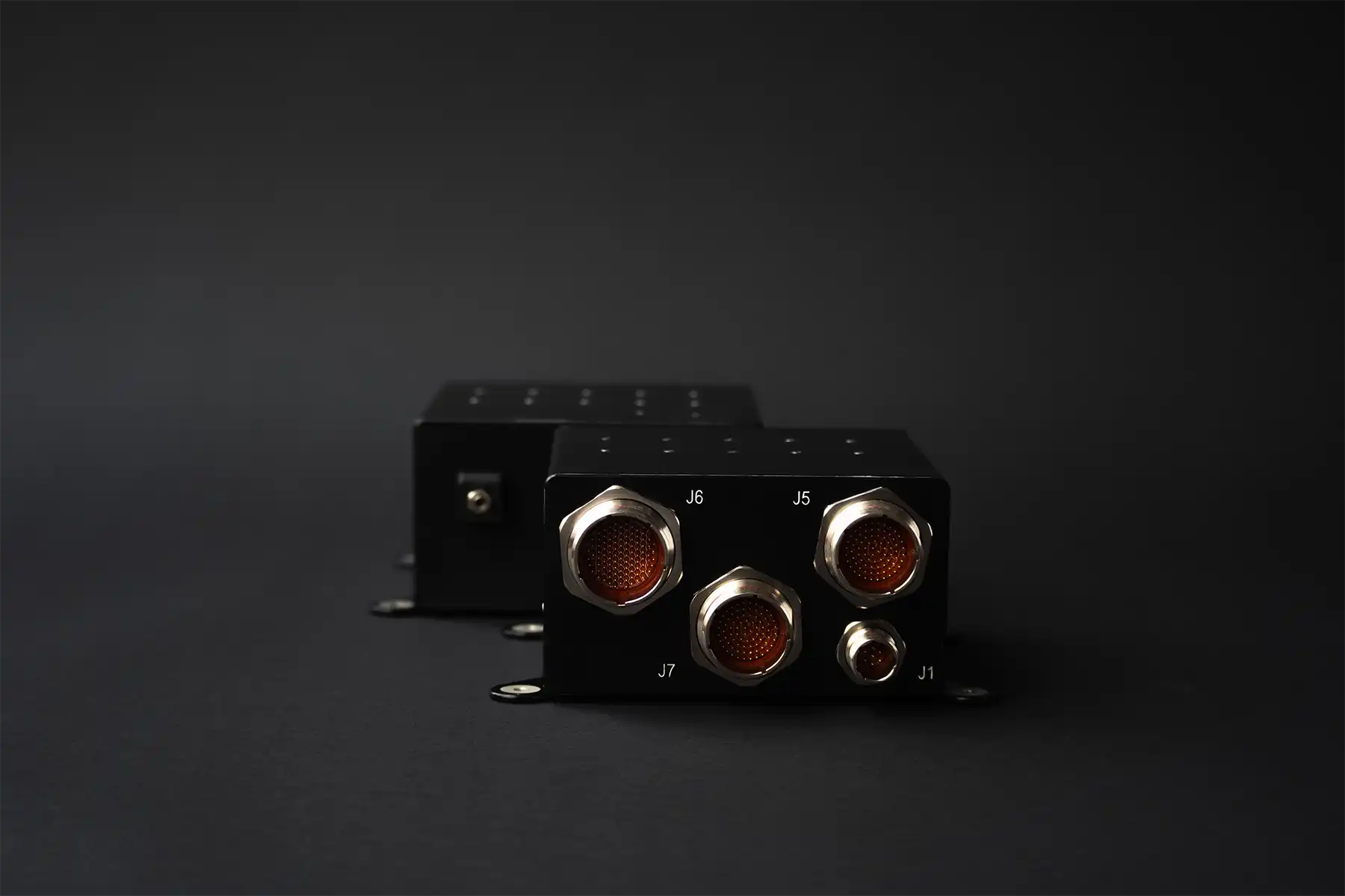 Two mission computers with multiple aerospace-grade connectors