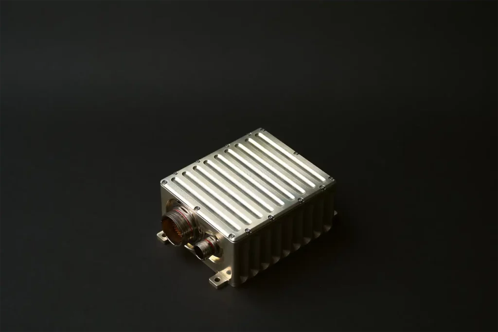 Side-angle view of metallic stores management system box with port access