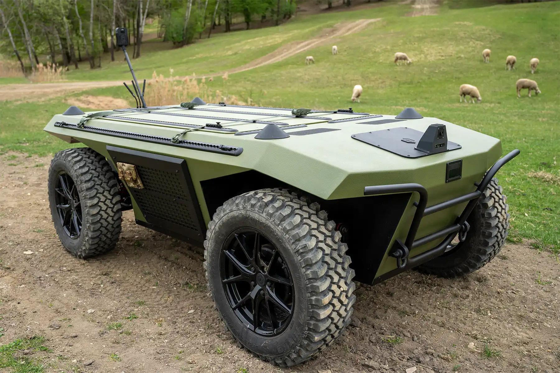 Autonomous UGV navigating uneven terrain during outdoor field testing
