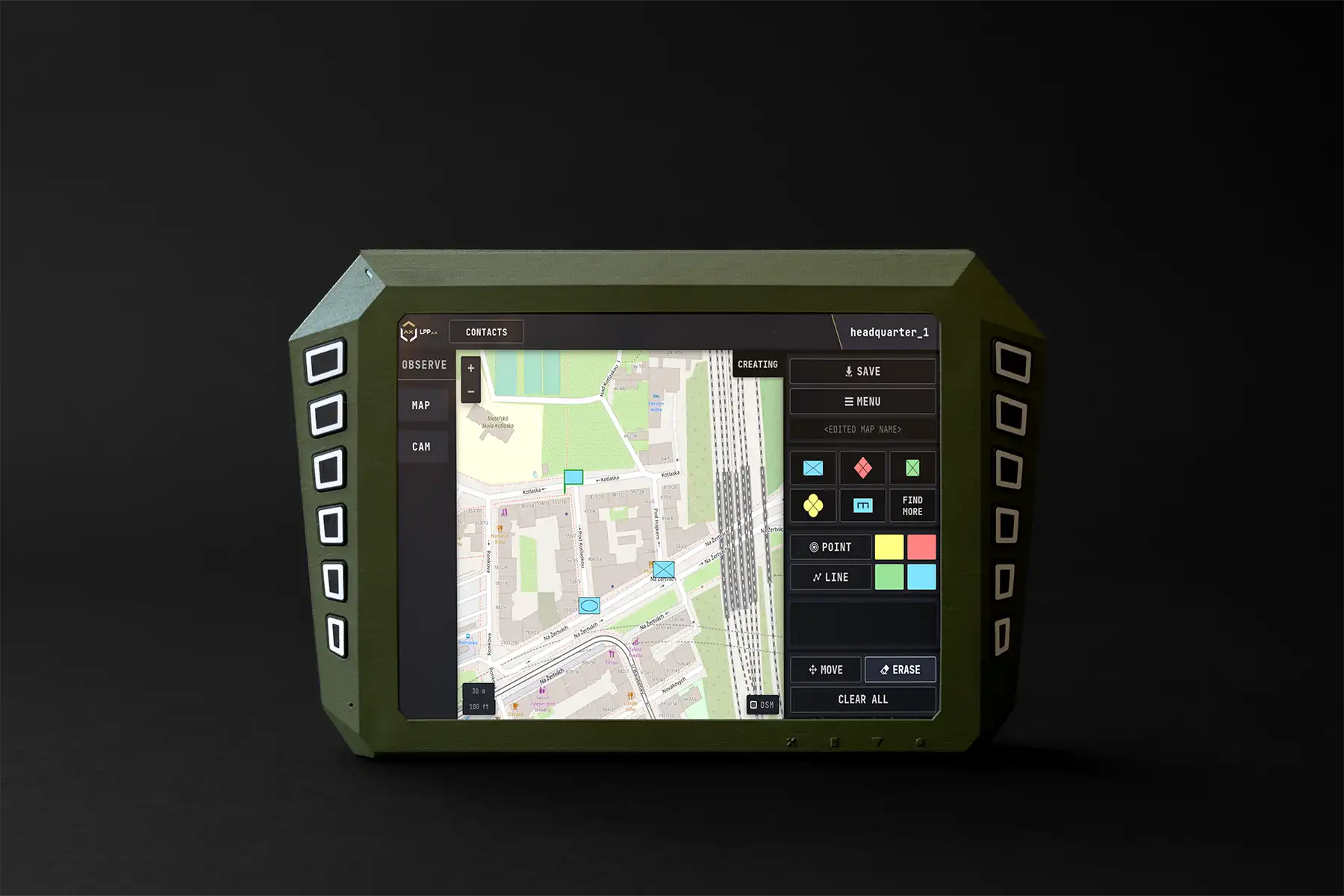 Close-up of Blue Force Tracker device with mission control screen
