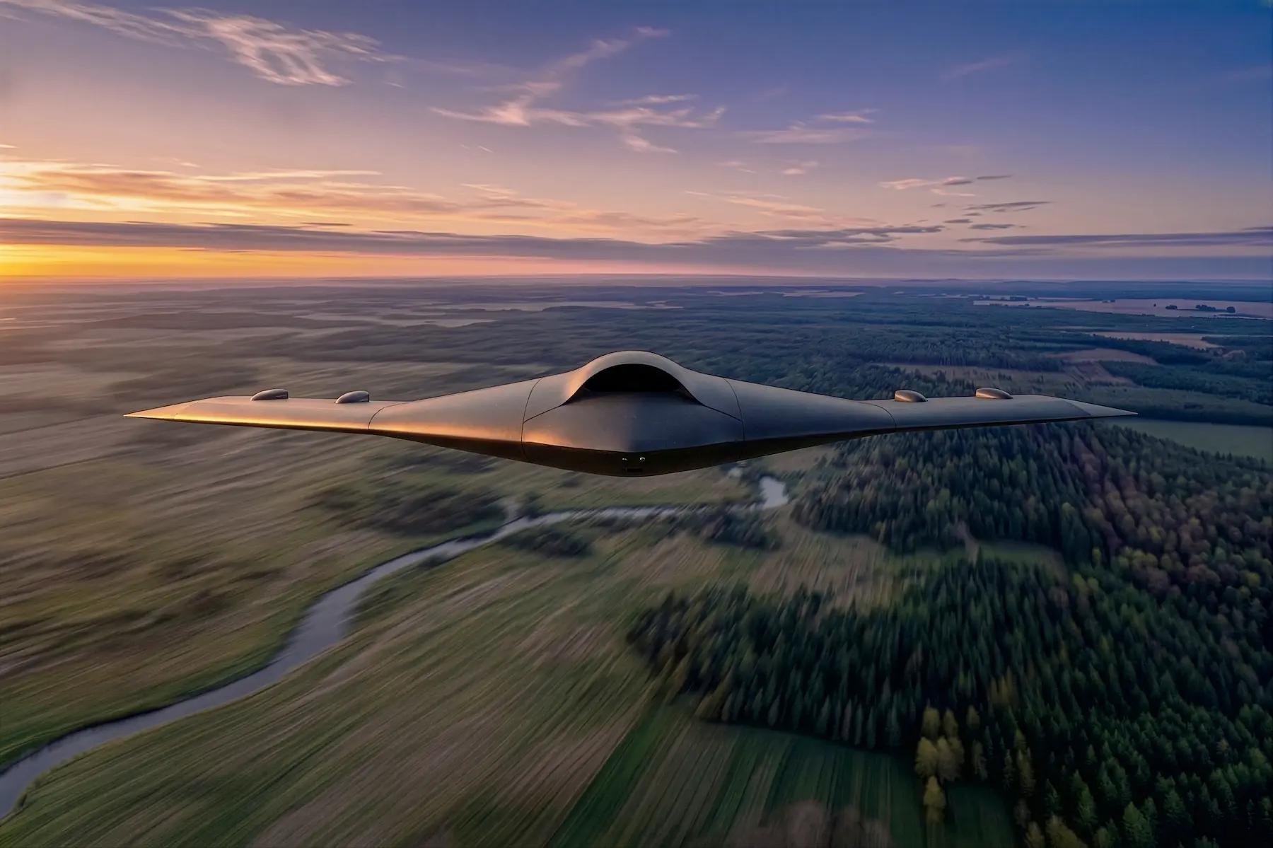 Front view of the Nightray stealth flying wing UAS during a low-altitude flight.