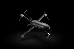 High-speed Interceptor quadcopter drone for remote counter-UAV operations isolated on a black background.